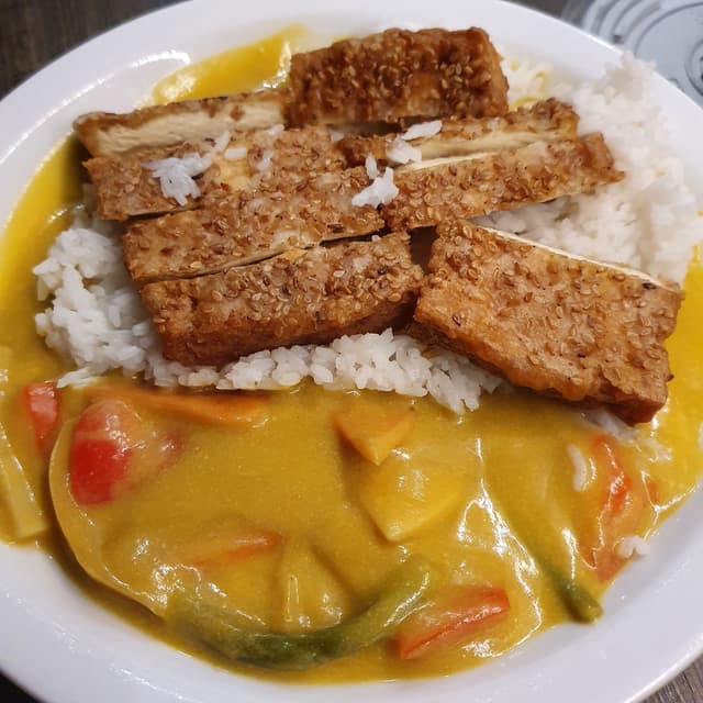 Photo of the dish “Sesam Tofu in Mangosoße mit Reis”