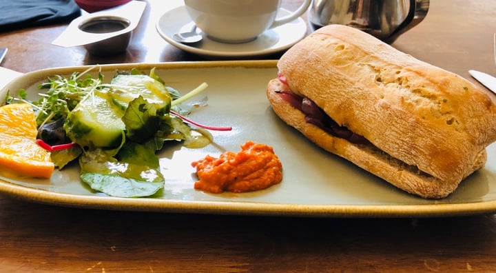 review photo of Goji Cafe Vegetarian Cafe & Deli Vegan Sausage on ciabatta with chunky mushrooms and fried red onions shared by @elfie33 on 08 Mar 2020 - review
