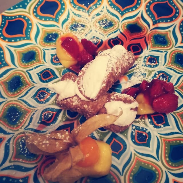 Photo of the dish “Cannoli siciliani con crema montata di cocco e crema al passion fruit”