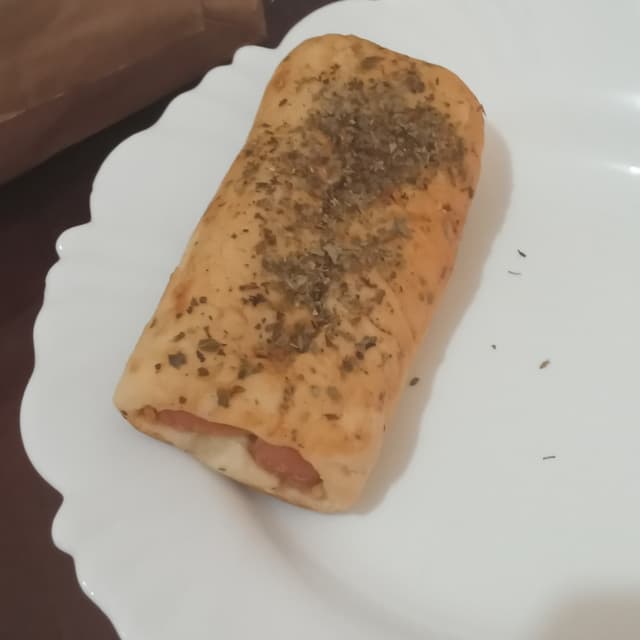 Photo of the dish “Enroladinho de salsinha vegano com molho de tomate”
