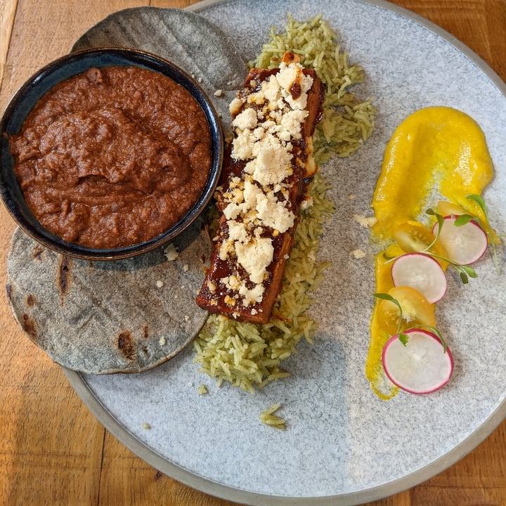 photo of mallow pibil tofu, arroz verde, salsa amarilla, blue corn tortillas, black bean mole, queso fresco shared by @lisastripiti on  06 Jun 2022 - review