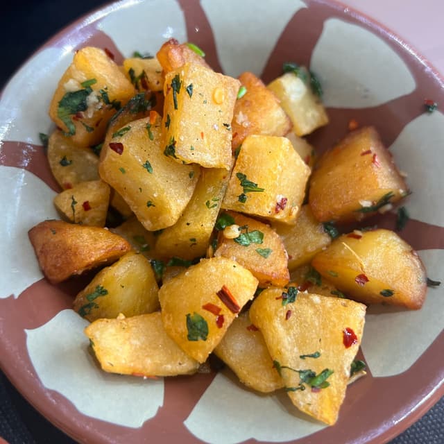 Foto del plato “Batata Harra”