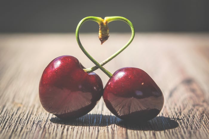 two cherries that make a heart