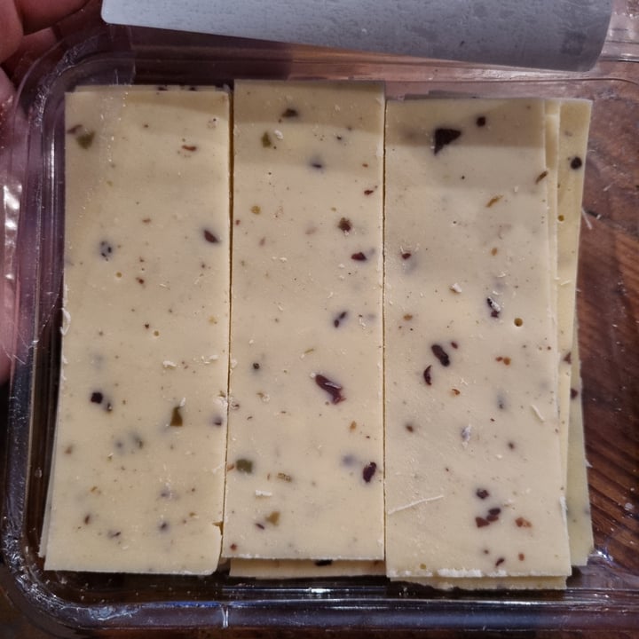 photo of Woolworths Food Dairy free cheddar and olive flavoured shared by @carmz on  02 Nov 2022 - review