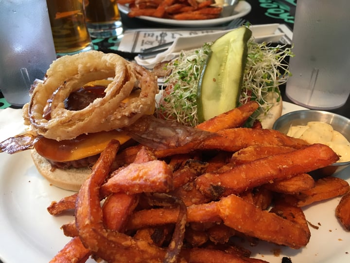 photo of Fish on Fifth The Beyond beef burger with, vegan cheese, bacon bun and mayo.  This restaurant has over 25 vegan options on their menu!  Two thumbs up! shared by @maggie on  27 May 2018 - review