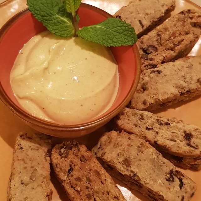 Photo of the dish “Cantucci Salati Di Farina Di Mais Con Olive E Pistacchi E Crema Al Curry”