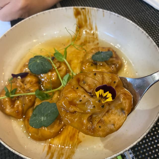 菜肴“Dumplings de setas”的照片