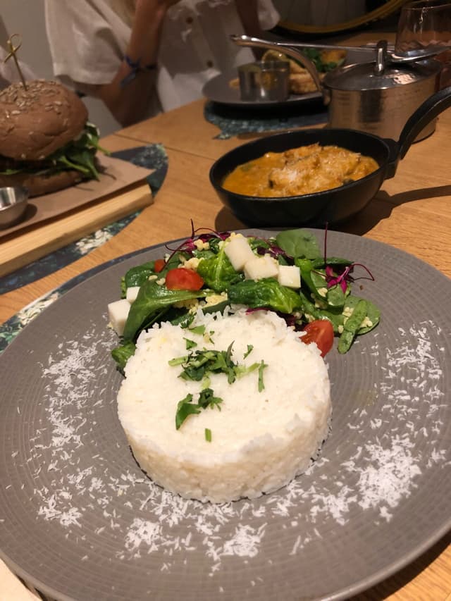 Photo of the dish “Chefs recommendation - sweet cauliflower curry with rice and salad”