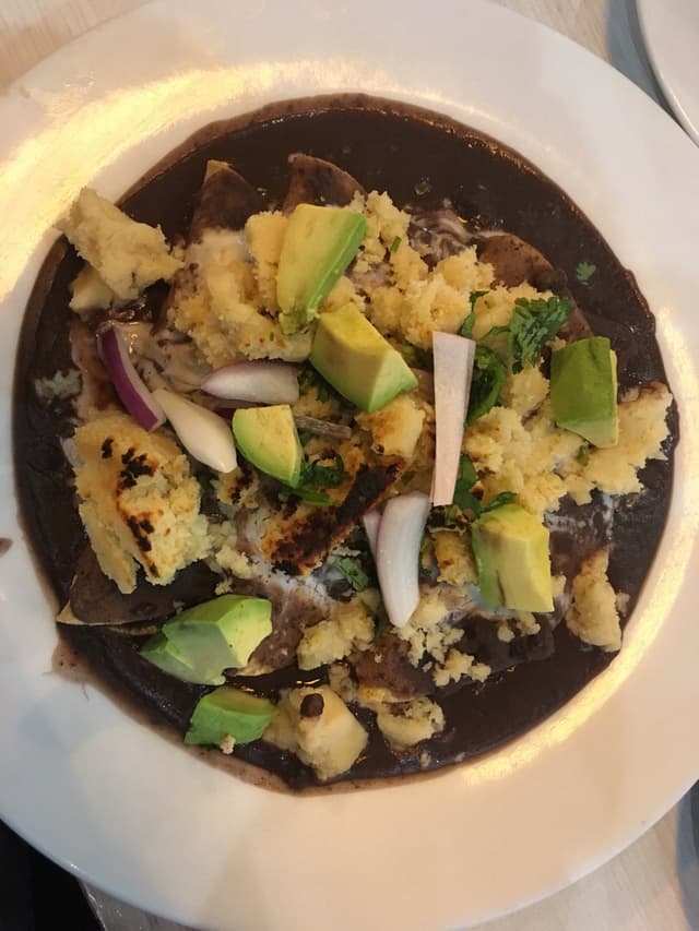 Photo of the dish “Enfrijoladas de Yaca”