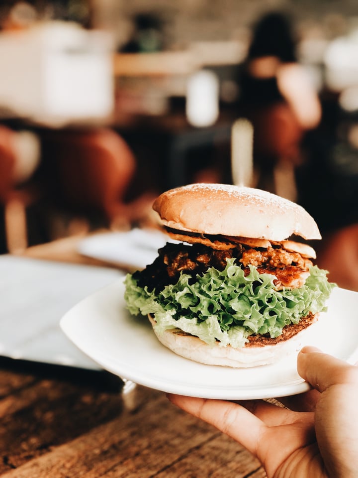photo of nomVnom Bistro Tempeh Rendang burger shared by @consciouscookieee on  01 Nov 2019 - review
