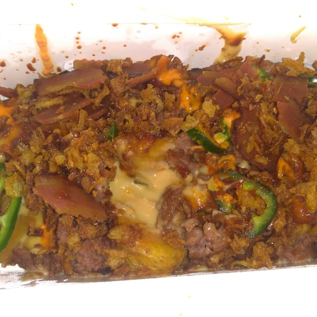 Foto do prato “Chilli Cheese Potato”