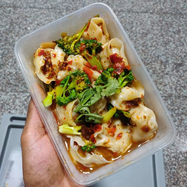 菜肴“Steam Dumpling with Mala Sauce”的照片
