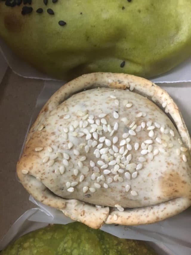 菜肴“Empanada de Cebolla y Queso”的照片