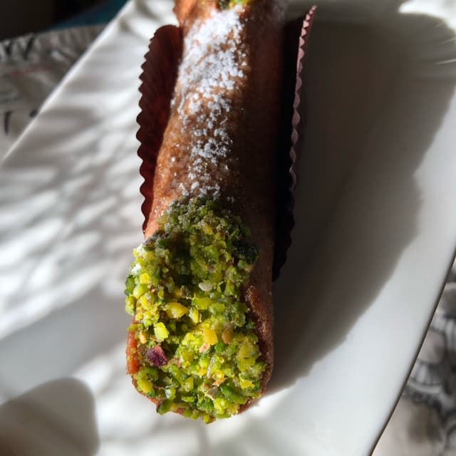 Foto do prato “Cannolo al Pistacchio”