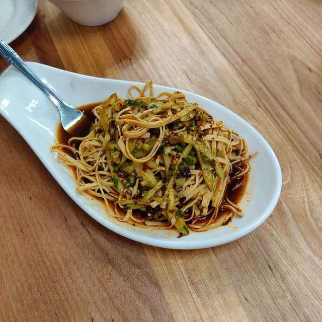 「Spicy Bai-Ye Tofu with Cucumber Strips」の料理の写真