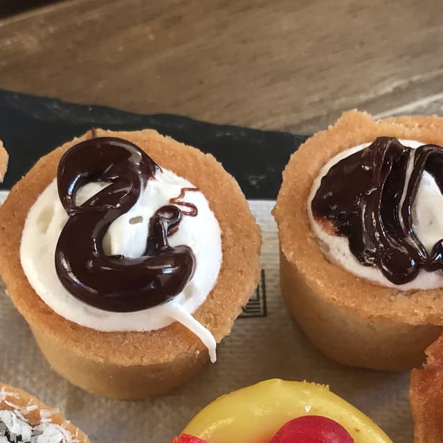 Photo of the dish “pasticcini panna e cioccolato”