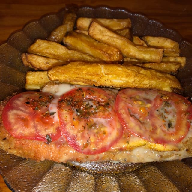 Photo of the dish “Milanesa De Seitan A La Napolitana Con Papas”