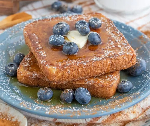 Vegan French Toast with syrup and blueberries