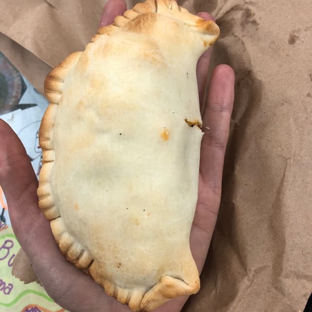 Foto del plato “Empanada de Seitán Cortado a Cuchillo”
