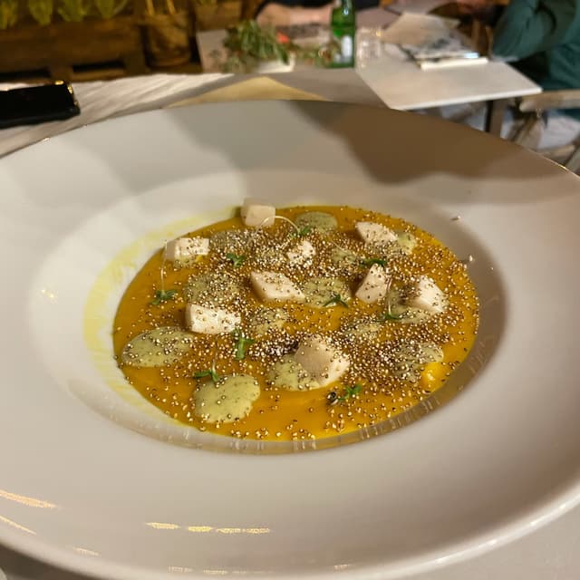 Photo of the dish “Vellutata Di Zucca Hokkaido, Canapa Sativa, Panna Acida Veg E Pop Di Amaranto”