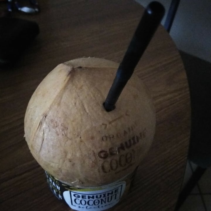 photo of Genuine Coconut Fresh Organic Coconut with a straw and a bamboo stick shared by @kaanubuai on  06 Jul 2021 - review