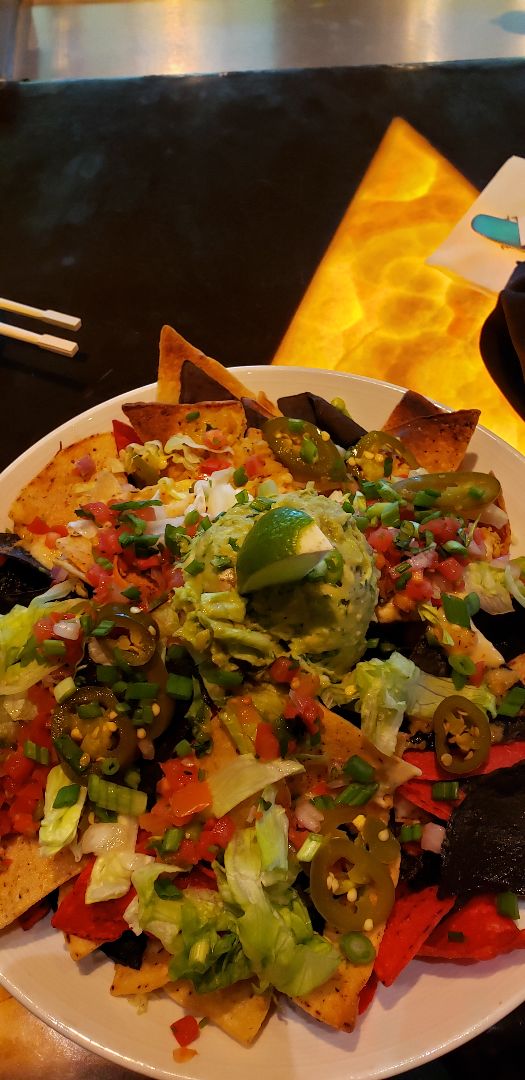 photo of Crave American Kitchen & Sushi Bar Loaded Signature Nachos shared by @ambularfortheanimals on  21 Dec 2019 - review
