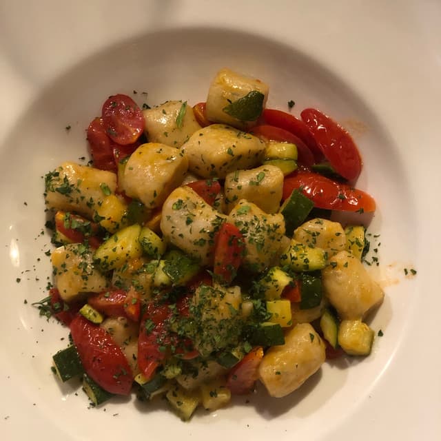 Photo of the dish “Gnocchi di patate e menta con pomodorini e zucchine”