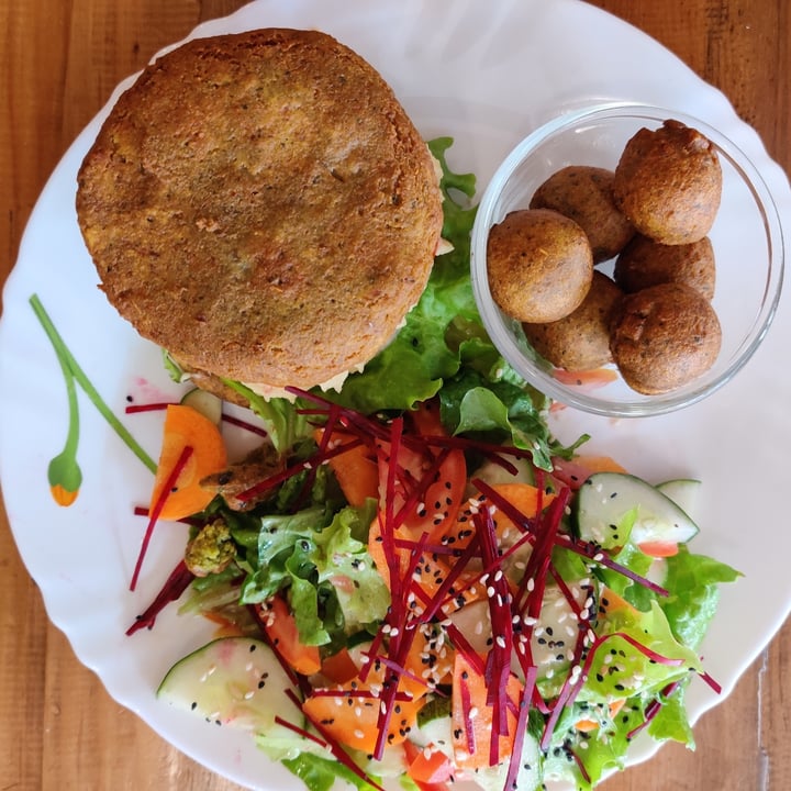 photo of Ambient Cafe Eggplant hummus veggie burger served with falafel and salad shared by @sabineb on  06 Jun 2022 - review