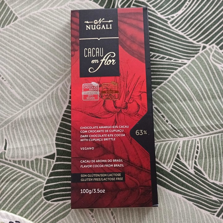 photo of Nugali Chocolates  Ind. Com. Ltda Chocolate Amargo 63% Cacau com Crocante de Cupuaçu shared by @pamioliveira on  23 Aug 2022 - review