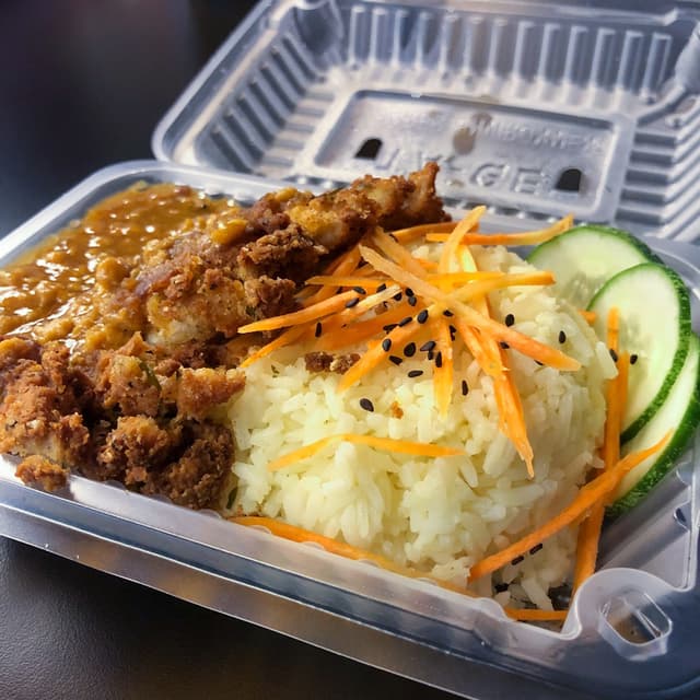 Photo of the dish “Curry Chicken Chop Rice”