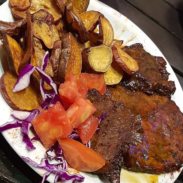 Foto do prato “Matambrito De Seitán A La Mostaza Con Batatas Fritas”