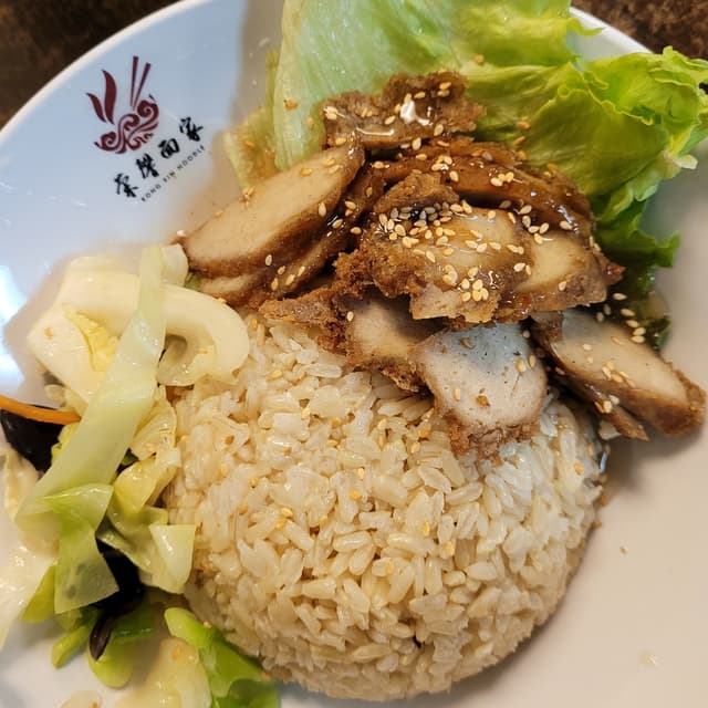 「chicken cutlet set with lemon sauce」の料理の写真