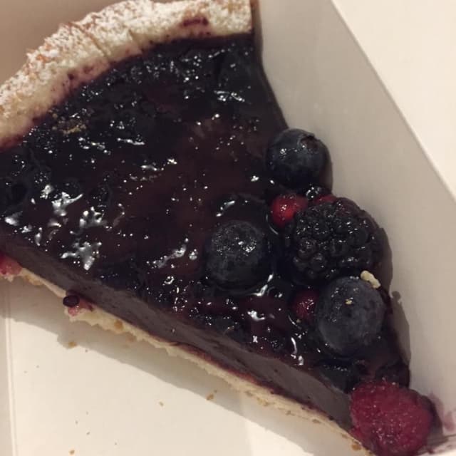 Photo of the dish “Crostata cioccolato e frutti di bosco”