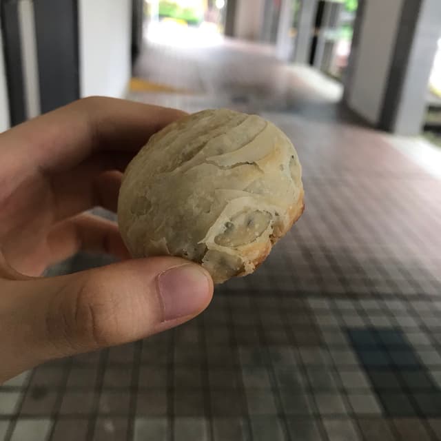 Foto do prato “Black Sesame Bun”