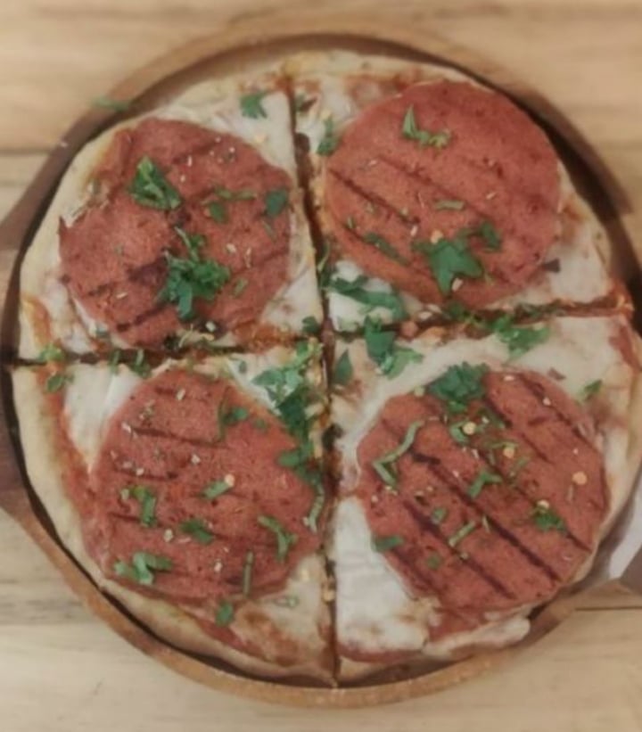 photo of Ubuntu Community - The Vegan Cafe Pepperoni Pizza shared by @arti on  19 Feb 2020 - review