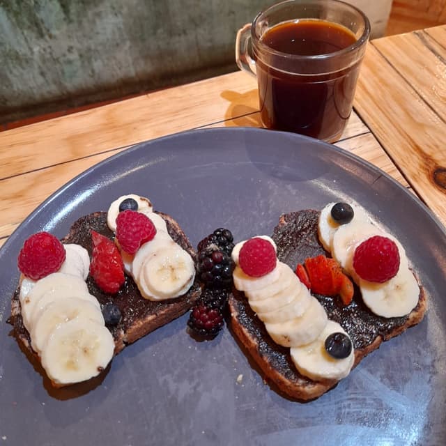 Foto do prato “Pan tostado con crema de avellanas”