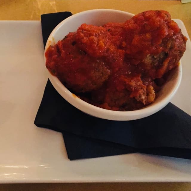 「Polpette al sugo vegan」の料理の写真