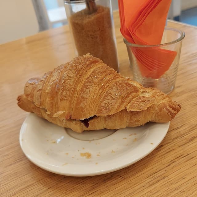 Foto do prato “Brioche Veg Con Marmellata Di Mirtilli”