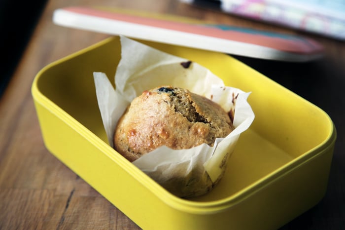 bread in yellow lunchbox