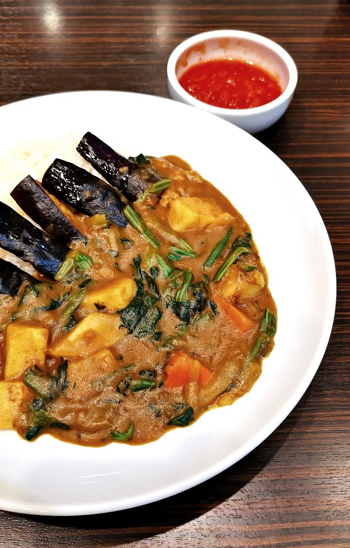 photo of CoCo Ichibanya Rinku Seacle Vegetarian Curry with eggplant, spinach and ripe tomatoes shared by @iluvnippon on  16 Jul 2019 - review