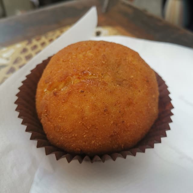 Foto del plato “arancina vegana ai funghi”