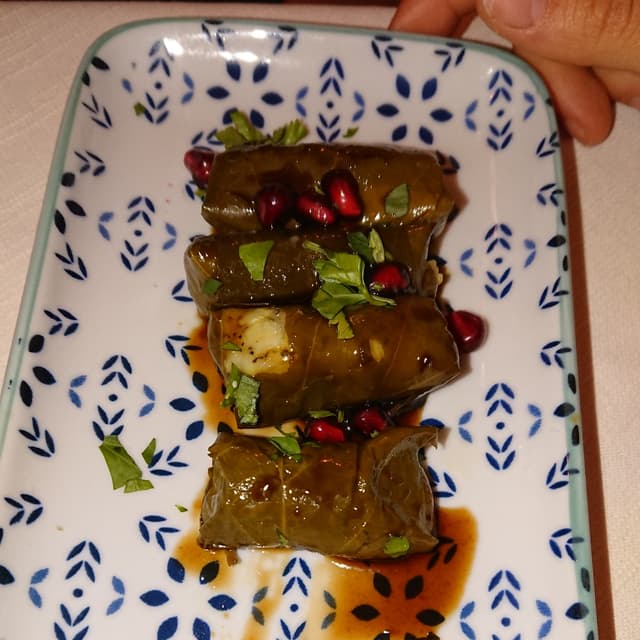 「Involtini Di Foglie Di Vite」の料理の写真