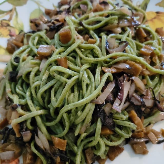 Photo of the dish “tagliolini di Boraggine con ragu bianco ri seitan e trevisana”