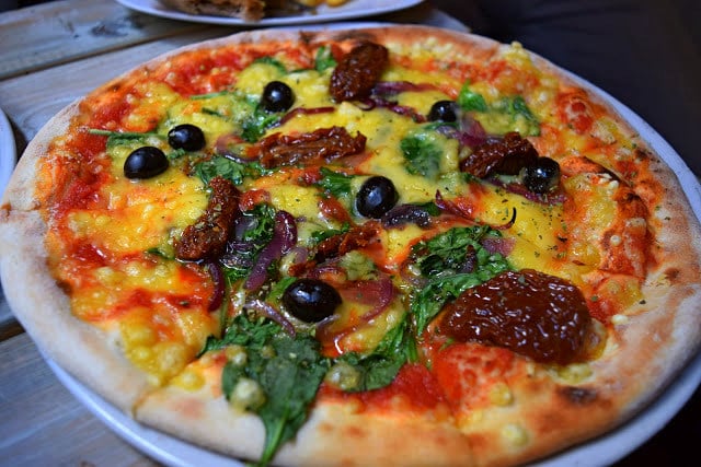 review photo of Ay mi madre! Mediterranean pizza, BBQ pizza, aubergine sandwich and empanadas shared by @travellingweasels on 19 Apr 2021 - review