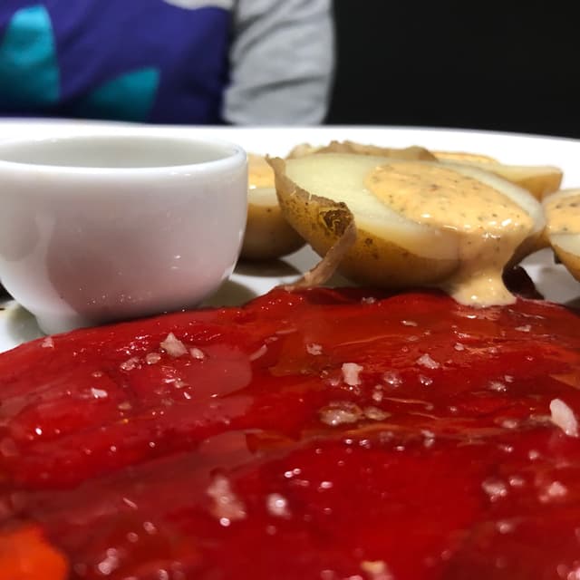 Photo of the dish “Pimientos rojos con patatas”