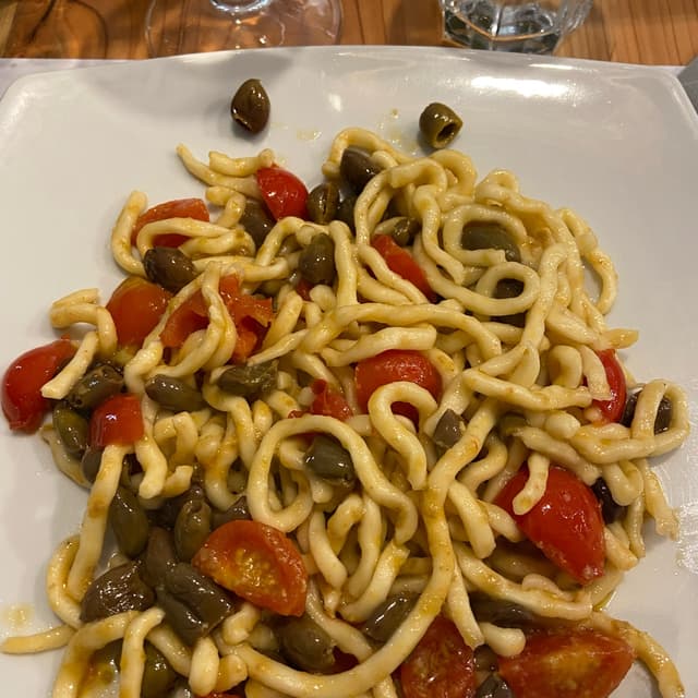 Photo of the dish “umbrichelli pachino e olive”