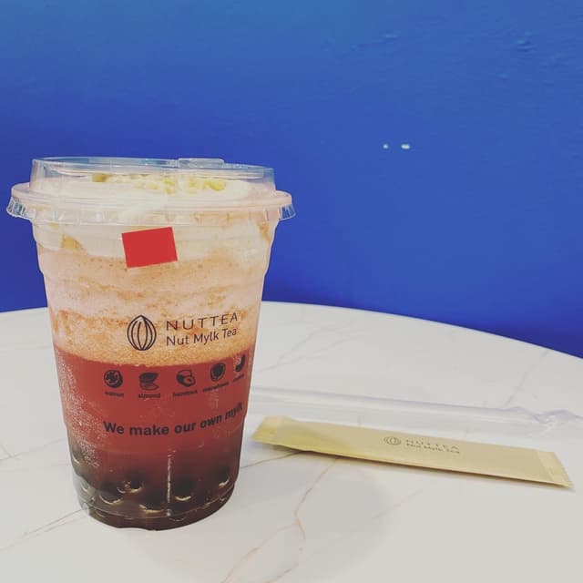Foto do prato “Watermelon Tea with Nut Cream”