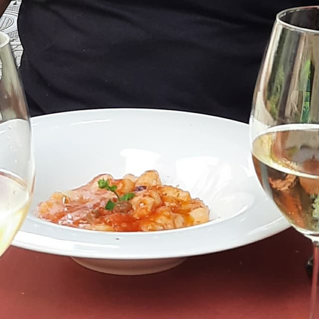 Photo of the dish “gnocchi al sugo di pelati, capperi e olive”