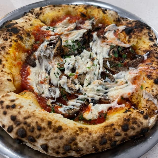 Foto do prato “Pizza De Champiñones”