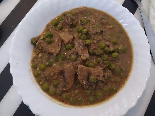 Photo of the dish “Mutter Chettinad de champiñones”